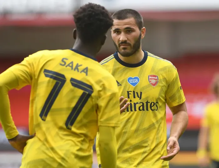 Framed Print : Arsenal's Kolasinac and Saka in Deep Conversation during FA Cup Quarterfinal vs Sheffield United Framed Print : Arsenal's Kolasinac and Saka in Deep Conversation during FA Cup Quarterfinal vs Sheffield United