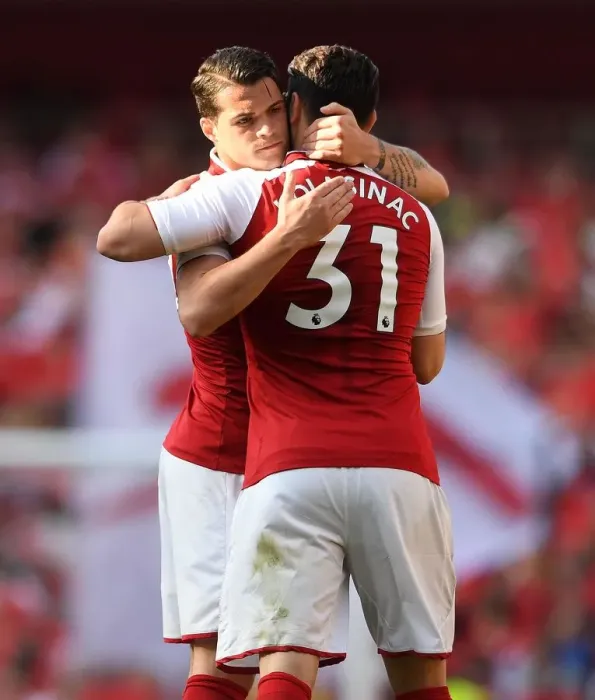 Framed Print : Arsenal's Kolasinac and Xhaka Celebrate Goal Against Burnley (2017-18)