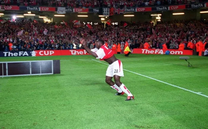 Framed Print : Arsenal's Kolo Toure Celebrates FA Cup Victory with Epic Backflip