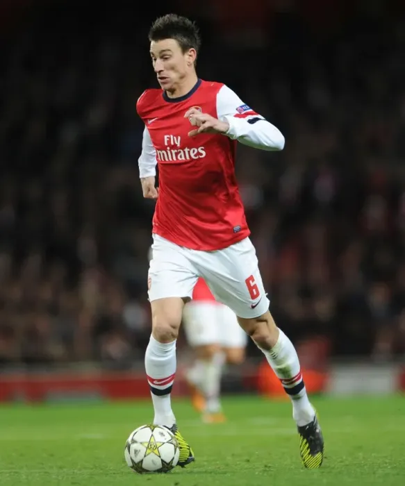 Framed Print : Arsenal's Koscielny in Action: Arsenal vs. Montpellier (Champions League 2012-13)