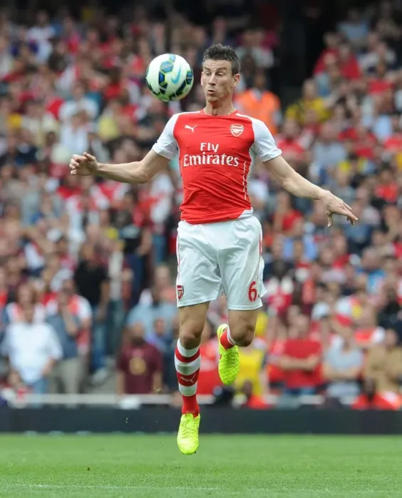 Framed Print : Arsenal's Koscielny in Action Against Manchester City (2014-15)