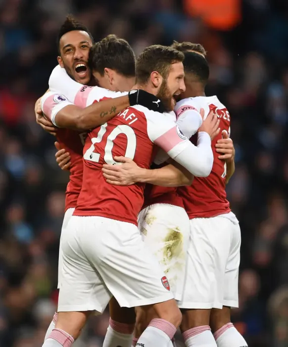 Framed Print : Arsenal's Koscielny, Aubameyang, and Mustafi Celebrate Goal Against Manchester City (2018-19) Framed Print : Arsenal's Koscielny, Aubameyang, and Mustafi Celebrate Goal Against Manchester City (2018-19)