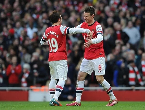 Arsenal's Koscielny and Cazorla Celebrate Goals Against Sunderland, 2014