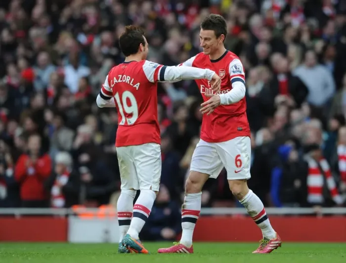 Framed Print : Arsenal's Koscielny and Cazorla Celebrate Goals Against Sunderland, 2014 Framed Print : Arsenal's Koscielny and Cazorla Celebrate Goals Against Sunderland, 2014