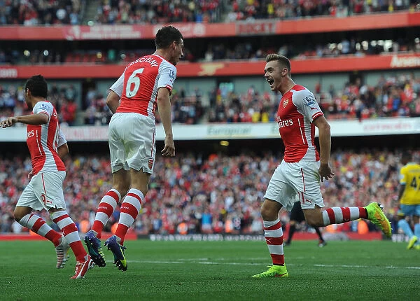 Arsenal's Koscielny and Chambers Celebrate Goal Against Crystal Palace (2014 / 15)