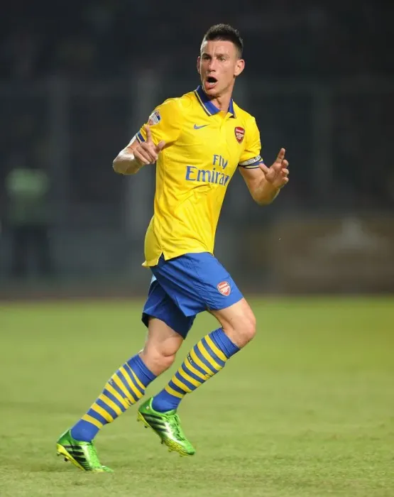 Framed Print : Arsenal's Koscielny Clashes with Indonesia All-Stars in 2013 Framed Print : Arsenal's Koscielny Clashes with Indonesia All-Stars in 2013