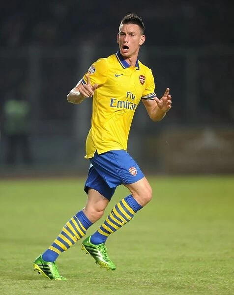 Arsenal's Koscielny Clashes with Indonesia All-Stars in 2013