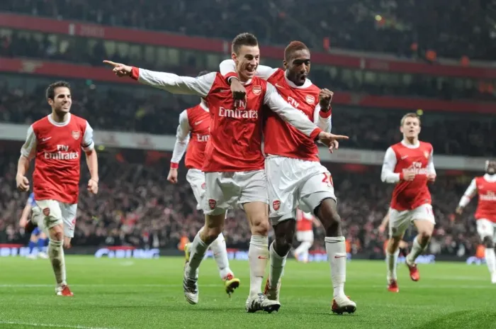 Framed Print : Arsenal's Koscielny, Djourou, and Fabregas: Celebrating the Second Goal in Carling Cup Semi-Final Victory over Ipswich Town (3:0, 3:1 agg) Framed Print : Arsenal's Koscielny, Djourou, and Fabregas: Celebrating the Second Goal in Carling Cup Semi-Final Victory over Ipswich Town (3:0, 3:1 agg)