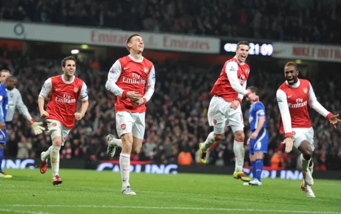 Framed Print : Arsenal's Koscielny, Djourou, Fabregas, and van Persie: Celebrating a 3:0 (3:1 agg) Carling Cup Semi-Final Victory over Ipswich Town Framed Print : Arsenal's Koscielny, Djourou, Fabregas, and van Persie: Celebrating a 3:0 (3:1 agg) Carling Cup Semi-Final Victory over Ipswich Town