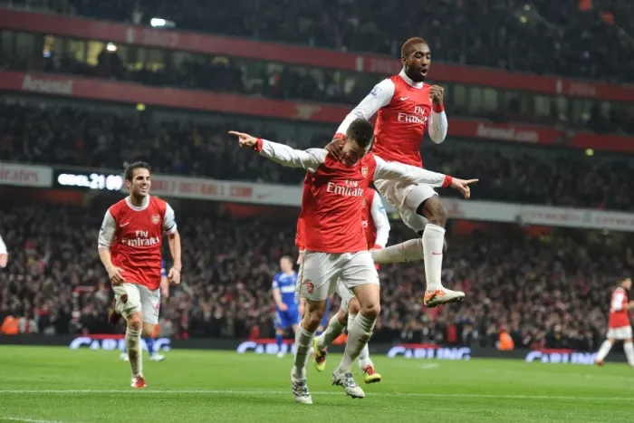Framed Print : Arsenal's Koscielny, Djourou, and Fabregas Celebrate Second Goal in Carling Cup Semi-Final Victory