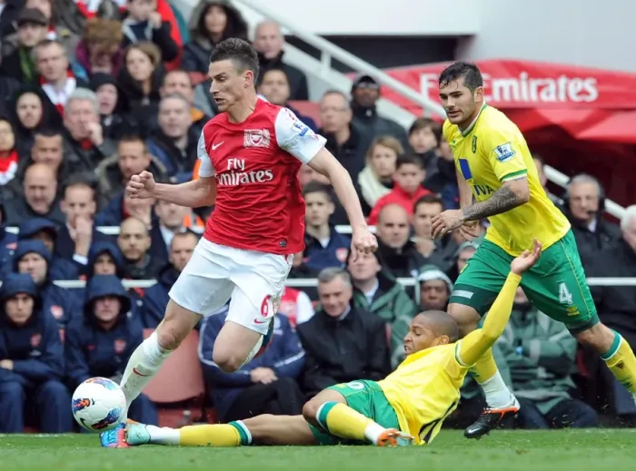 Framed Print : Arsenal's Koscielny Fouls by Norwich's Jackson in 2012 Premier League Clash