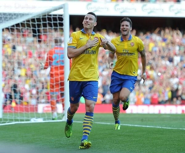 Arsenal's Koscielny and Giroud Celebrate Goals in Arsenal v Napoli Emirates Cup Clash