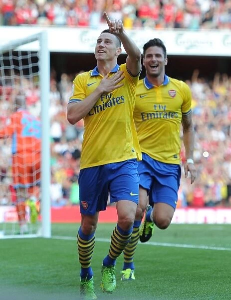 Arsenal's Koscielny and Giroud Celebrate Goals Against Napoli in 2013 Emirates Cup