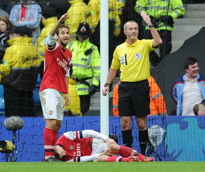 Framed Print : Arsenal's Koscielny Injured, Flamini Reacts: Manchester City vs Arsenal, Premier League 2013-14 Framed Print : Arsenal's Koscielny Injured, Flamini Reacts: Manchester City vs Arsenal, Premier League 2013-14