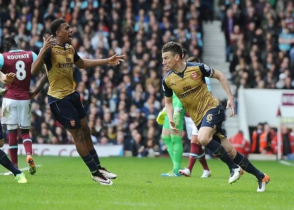 Arsenal's Koscielny and Iwobi Celebrate Goals Against West Ham in 2016 Premier League Match