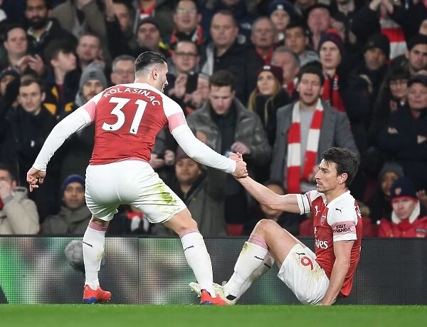 Arsenal's Koscielny and Kolasinac: A Battle of Defensive Might in the Arsenal v Chelsea Clash (2018-19)
