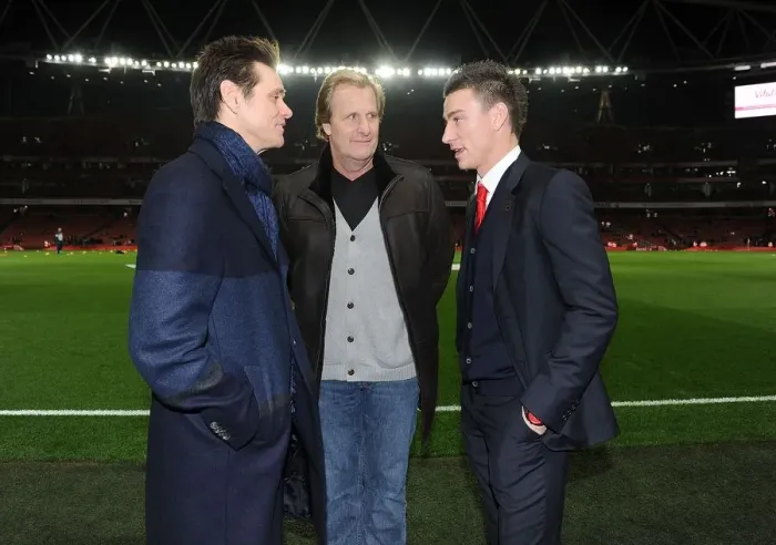 Framed Print : Arsenal's Koscielny Meets Jim Carrey and Jeff Daniels Before Arsenal v Manchester United Match