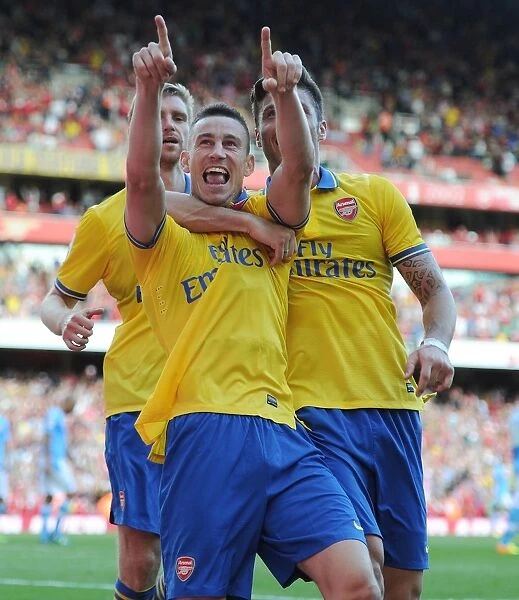 Arsenal's Koscielny, Mertesacker, and Giroud: Celebrating a Winning Goal Against Napoli in the 2013-14 Emirates Cup