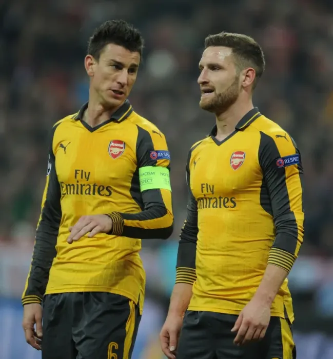 Framed Print : Arsenal's Koscielny and Mustafi Face Off Against Bayern Munich in Champions League Showdown Framed Print : Arsenal's Koscielny and Mustafi Face Off Against Bayern Munich in Champions League Showdown