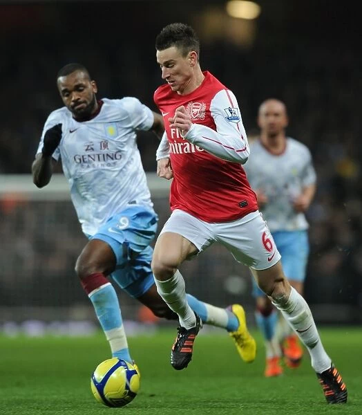 Arsenal's Koscielny Overpowers Aston Villa's Bent in FA Cup Clash