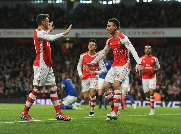 Arsenal's Koscielny and Ozil Celebrate First Goal Against Leicester City (2014-15)