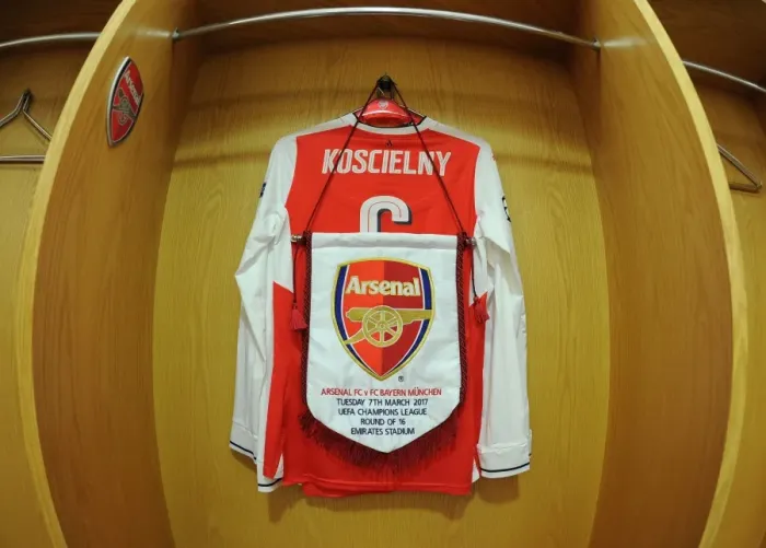 Framed Print : Arsenal's Koscielny Prepares for Bayern Showdown: A Peek into the Changing Room