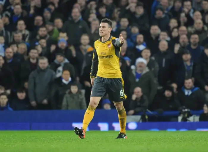 Framed Print : Arsenal's Koscielny Protests Referee Decision During Everton Clash (Premier League 2016-17) Framed Print : Arsenal's Koscielny Protests Referee Decision During Everton Clash (Premier League 2016-17)