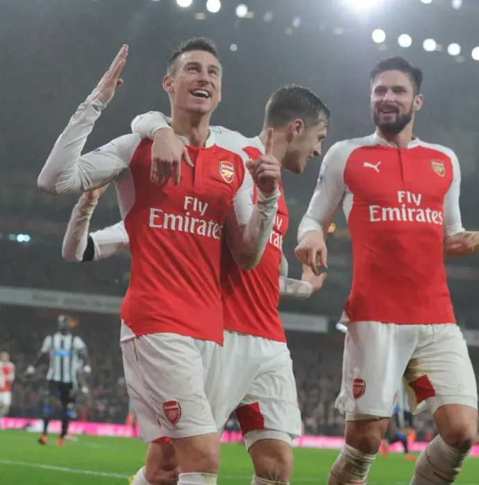 Framed Print : Arsenal's Koscielny, Ramsey, and Giroud Celebrate Goal Against Newcastle United (2015-16) Framed Print : Arsenal's Koscielny, Ramsey, and Giroud Celebrate Goal Against Newcastle United (2015-16)