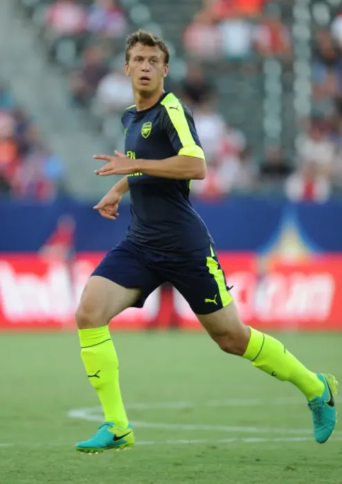 Framed Print : Arsenal's Krystian Bielik Faces Off Against Chivas in Pre-Season Friendly
