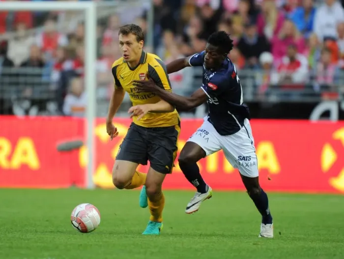 Framed Print : Arsenal's Krystian Bielik Outmuscles Usman Sala in Exciting Pre-Season Clash Framed Print : Arsenal's Krystian Bielik Outmuscles Usman Sala in Exciting Pre-Season Clash