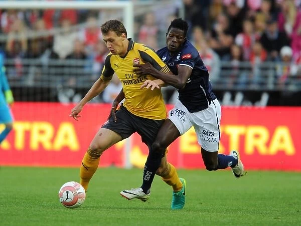 Arsenal's Krystian Bielik Overpowers Usman Sala in Thrilling Pre-Season Clash