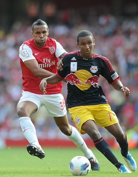 Arsenal's Kyle Bartley Faces Off Against New York Red Bulls Juan Agudelo during the 2011-12 Emirates Cup