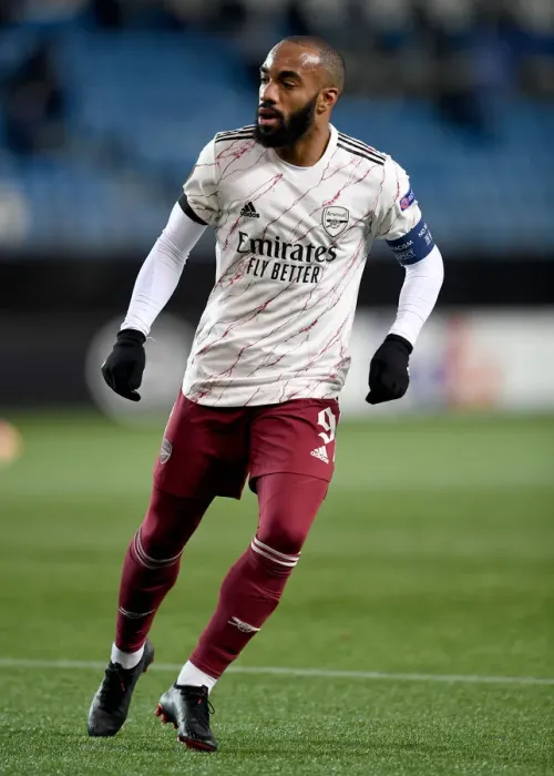 Framed Print : Arsenal's Lacazette in Action against Molde FK in Europa League Group Stage