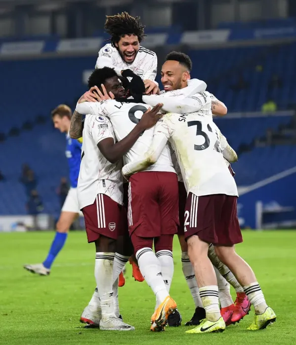 Framed Print : Arsenal's Lacazette, Aubameyang, and Elneny Celebrate Goal Against Brighton in Premier League