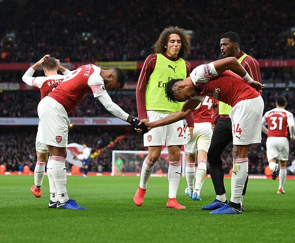 Arsenal's Lacazette and Aubameyang Celebrate Goals Against Tottenham in 2018-19 Premier League Clash