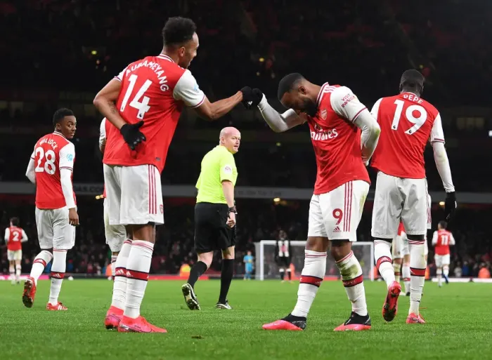 Framed Print : Arsenal's Lacazette and Aubameyang Celebrate Goals Against Newcastle United (2019-20) Framed Print : Arsenal's Lacazette and Aubameyang Celebrate Goals Against Newcastle United (2019-20)
