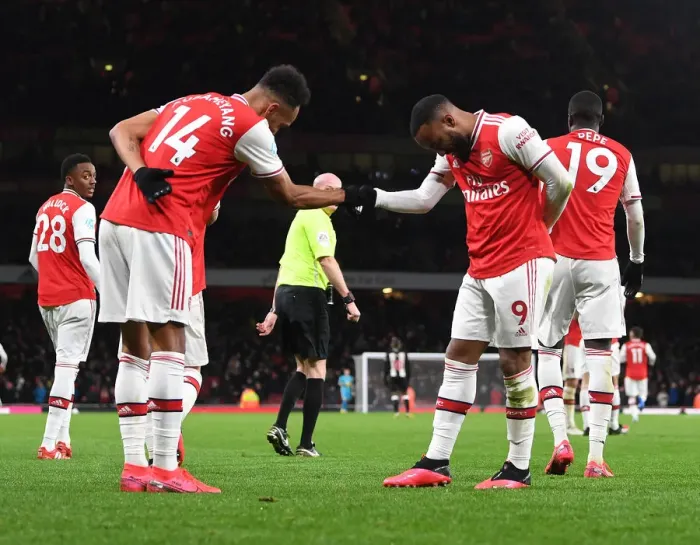 Framed Print : Arsenal's Lacazette and Aubameyang Celebrate Goals Against Newcastle United (2019-20) Framed Print : Arsenal's Lacazette and Aubameyang Celebrate Goals Against Newcastle United (2019-20)