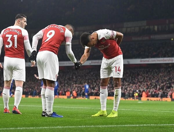 Arsenal's Lacazette and Aubameyang: Celebrating Glory against Chelsea in the Premier League Showdown