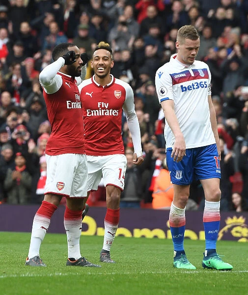 Arsenal's Lacazette and Aubameyang: A Harmonious Duo Celebrating Goals (Arsenal v Stoke City 2017-18)