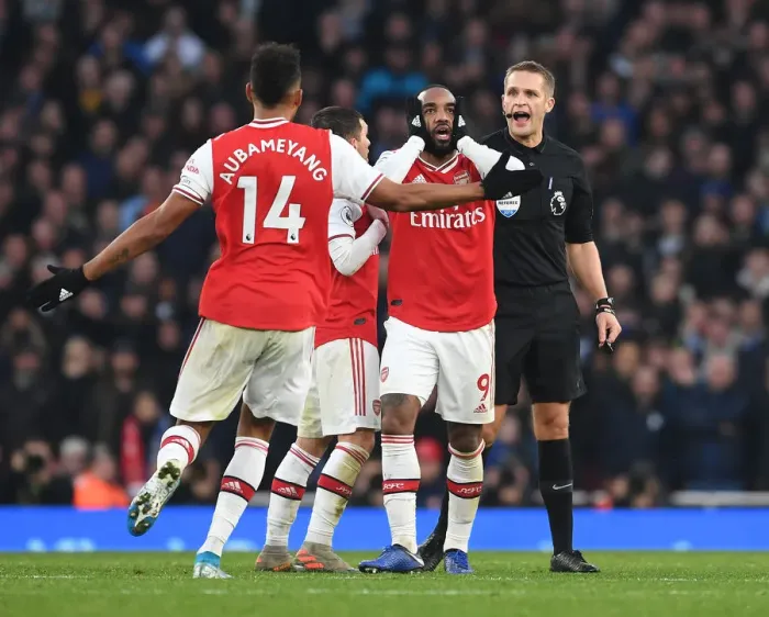 Framed Print : Arsenal's Lacazette and Aubameyang Protest Ref's Decision During Arsenal vs. Chelsea Clash (2019-20)