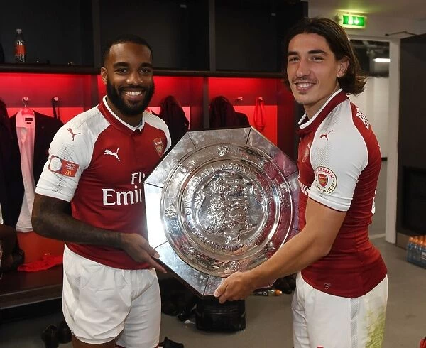 Arsenal's Lacazette and Bellerin Celebrate FA Community Shield Victory with the Trophy