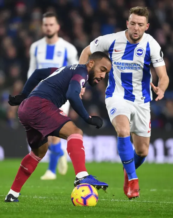 Framed Print : Arsenal's Lacazette Clashes with Brighton's Stephens in Premier League Showdown Framed Print : Arsenal's Lacazette Clashes with Brighton's Stephens in Premier League Showdown