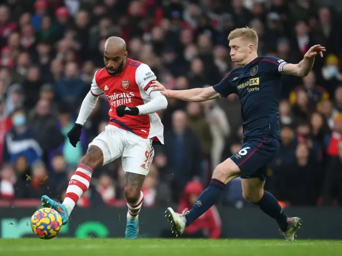 Framed Print : Arsenal's Lacazette Clashes with Burnley's Tarkowski in Intense Premier League Battle Framed Print : Arsenal's Lacazette Clashes with Burnley's Tarkowski in Intense Premier League Battle