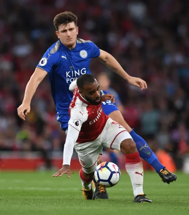 Framed Print : Arsenal's Lacazette Clashes with Leicester's Maguire in Premier League Showdown Framed Print : Arsenal's Lacazette Clashes with Leicester's Maguire in Premier League Showdown