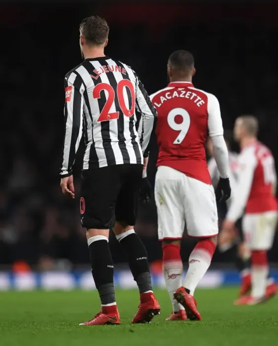 Framed Print : Arsenal's Lacazette Clashes with Newcastle's Lejeune in Premier League Showdown Framed Print : Arsenal's Lacazette Clashes with Newcastle's Lejeune in Premier League Showdown
