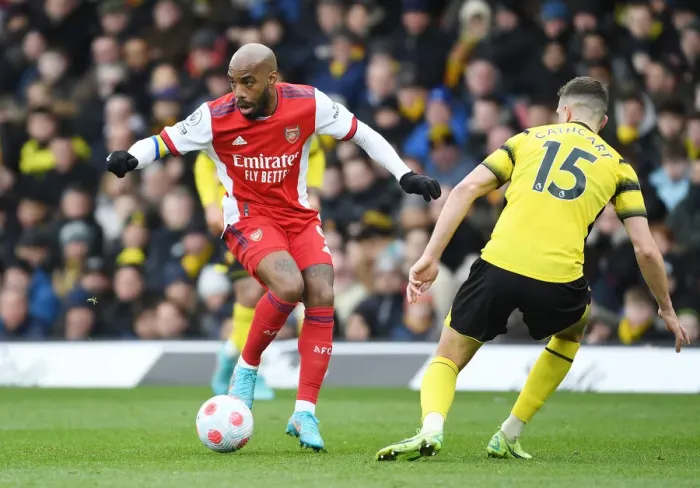 Framed Print : Arsenal's Lacazette Clashes with Watford's Cathcart in Premier League Showdown