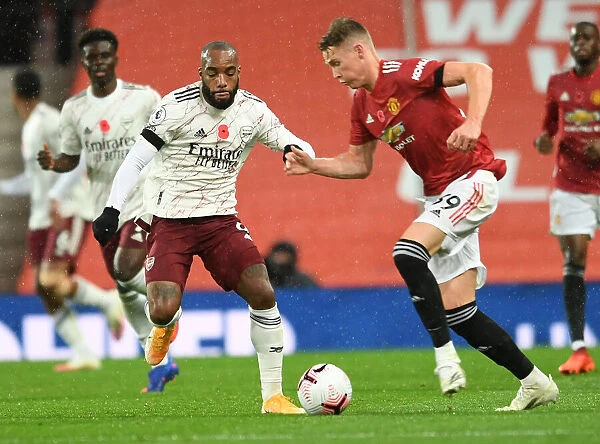 Arsenal's Lacazette Closes In On Manchester United's McTominay In Empty Old Trafford