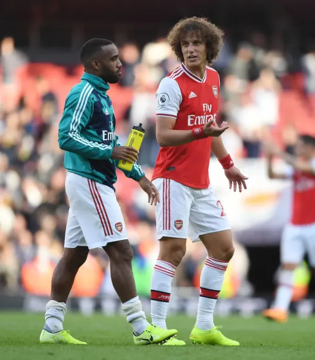 Framed Print : Arsenal's Lacazette and David Luiz: Savoring Their Hard-Fought Victory Over Tottenham