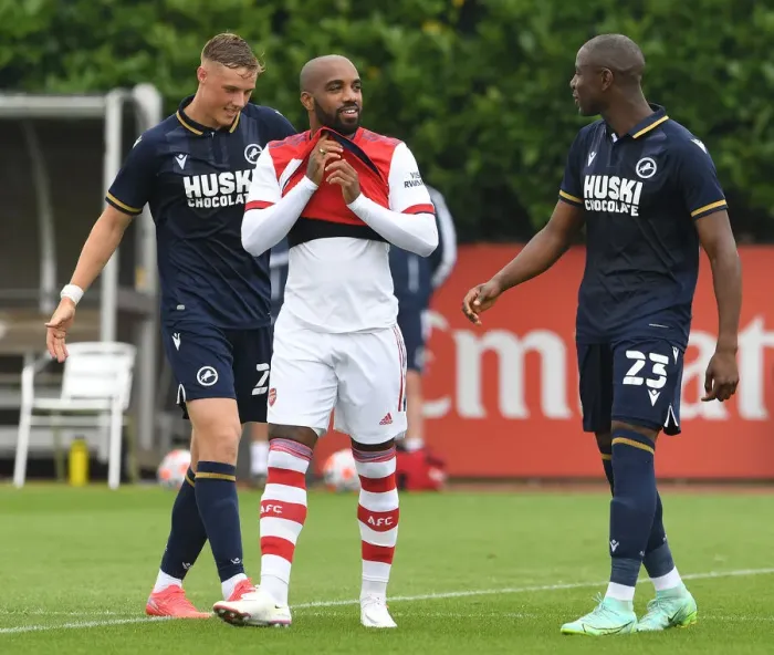 Framed Print : Arsenal's Lacazette Engages with Millwall's Afobe and Ballard during Pre-Season Friendly Framed Print : Arsenal's Lacazette Engages with Millwall's Afobe and Ballard during Pre-Season Friendly