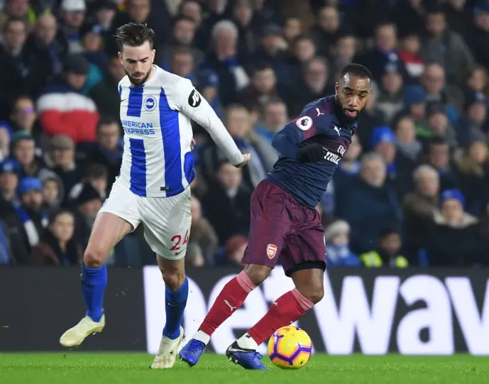 Framed Print : Arsenal's Lacazette Faces Off Against Brighton's Propper in Premier League Clash